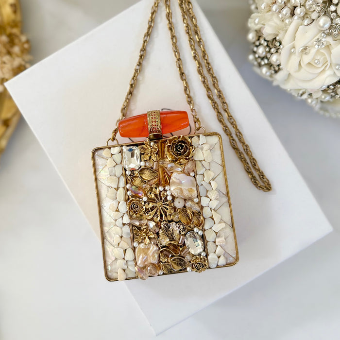 Mini Mother of Pearl Clutch : Gold Statement Clutch