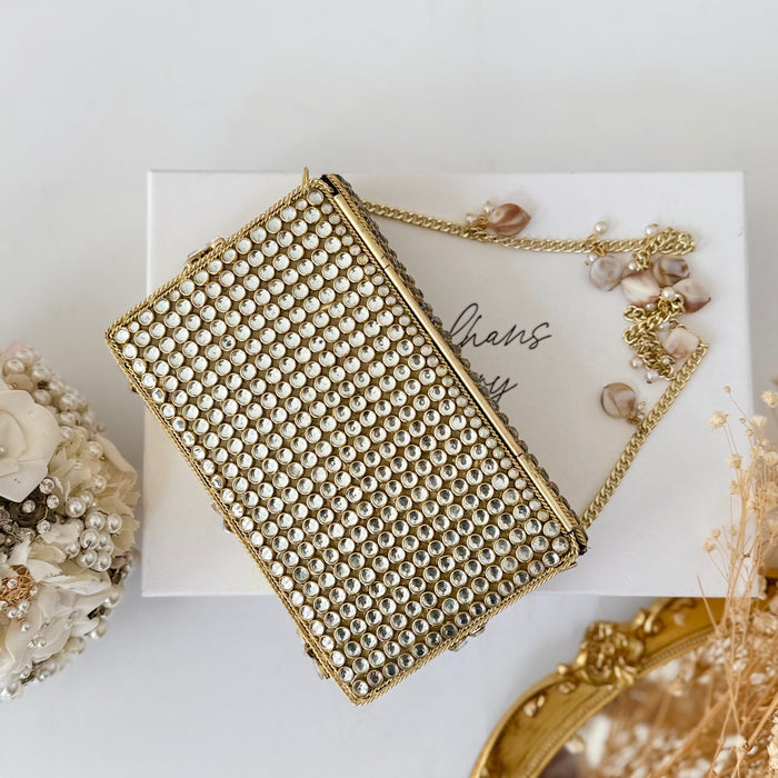 Natural Oval Onyx Gemstone Clutch | Kundan Detailing on Brass Frame
