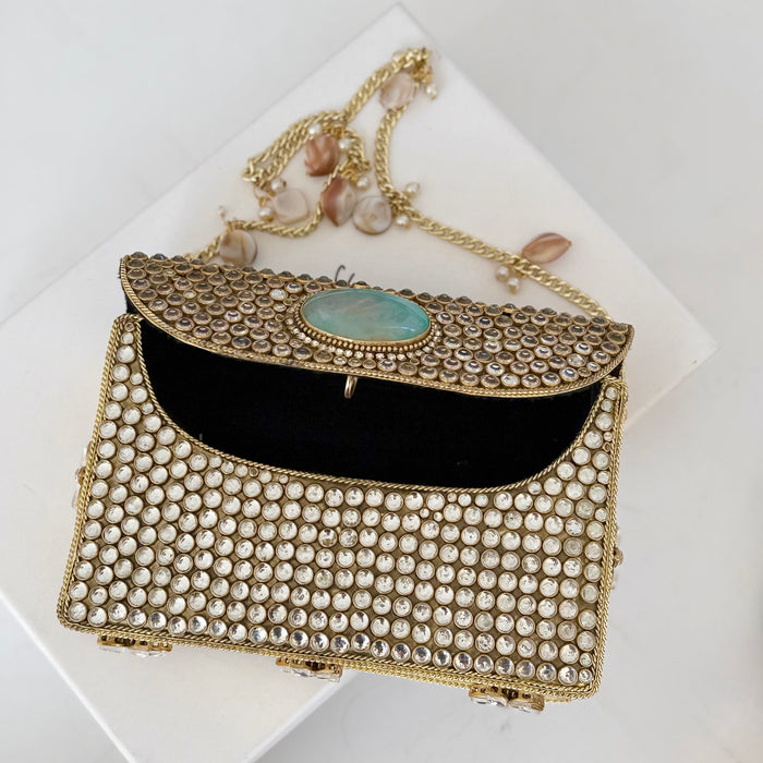 Natural Oval Onyx Gemstone Clutch | Kundan Detailing on Brass Frame