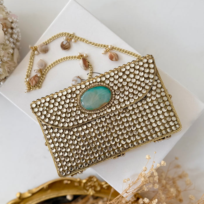 Natural Oval Onyx Gemstone Clutch | Kundan Detailing on Brass Frame