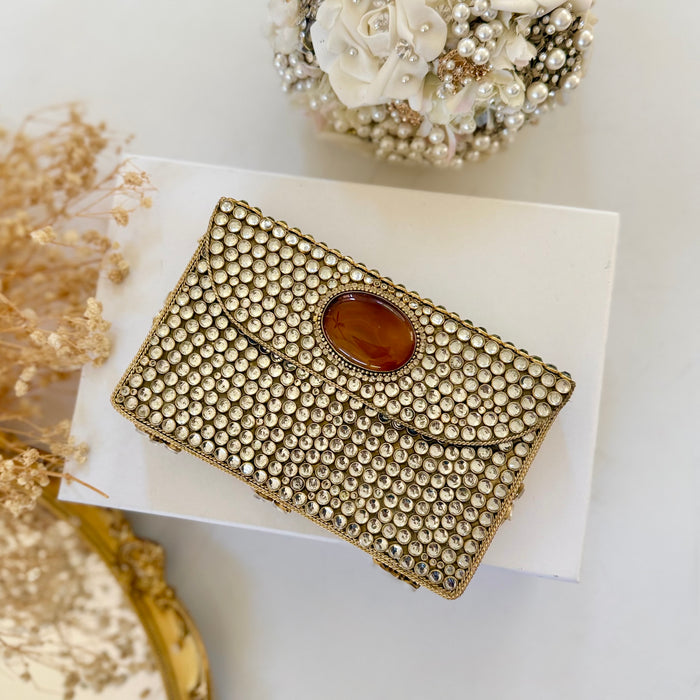 Natural Oval Brown Onyx Gemstone Clutch | Kundan Detailing on Brass Frame