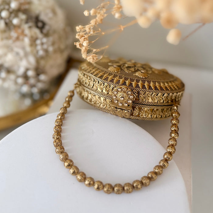 Mini Statement Antique Gold Metal Clutch
