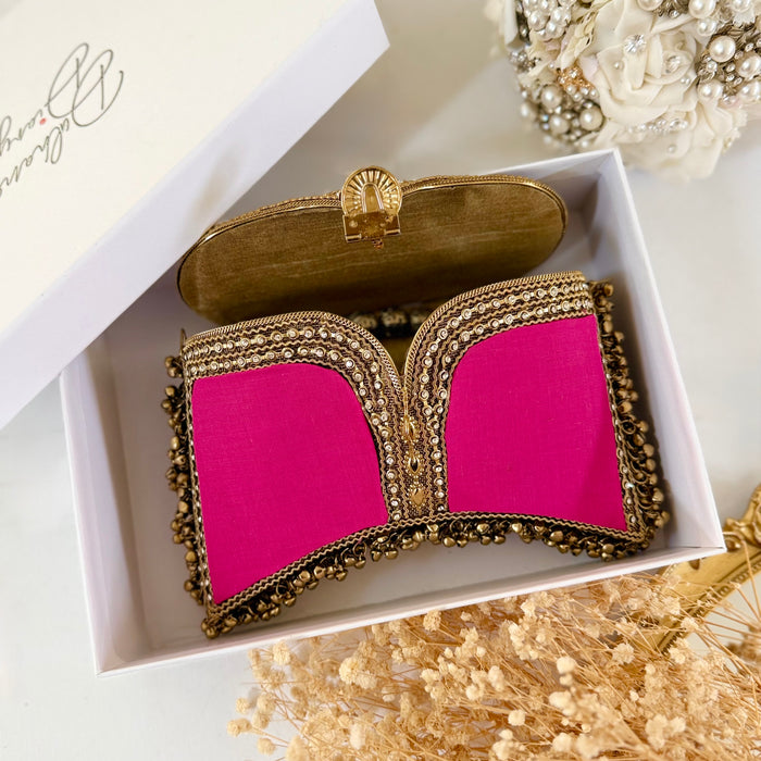 Handgemachte fuchsiafarbene Samt-Clutch: Statement-Abendtasche