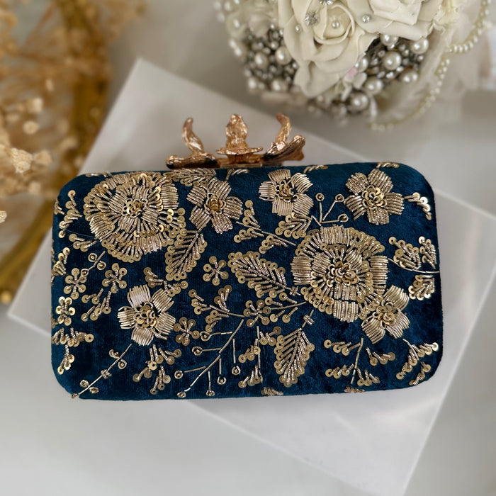 Royal blue clutch with gold floral embroidery