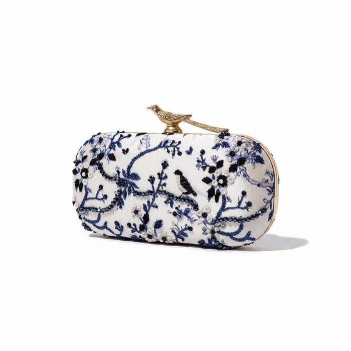 blue clutch with bird knob