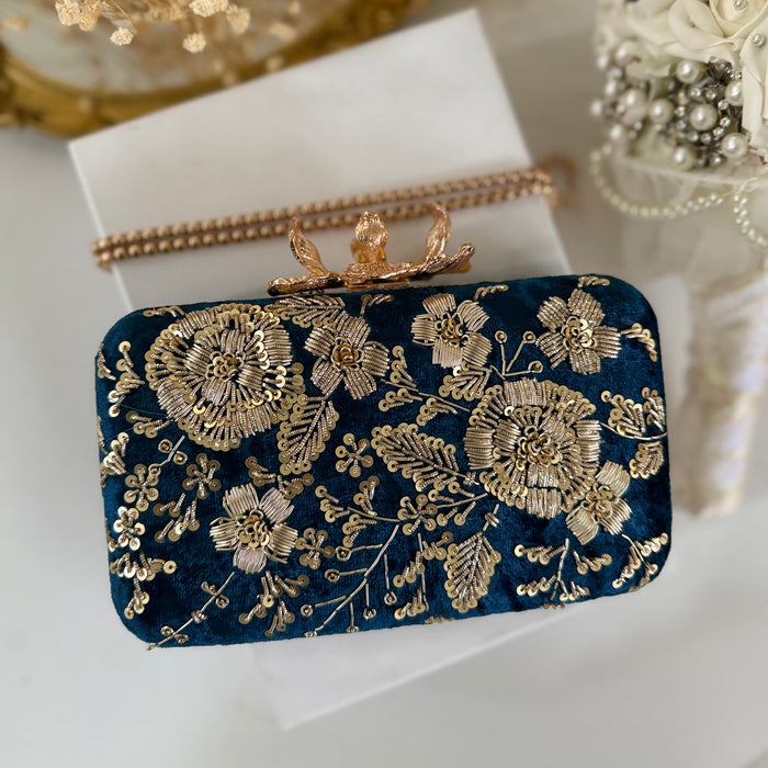 Royal blue clutch with gold floral embroidery