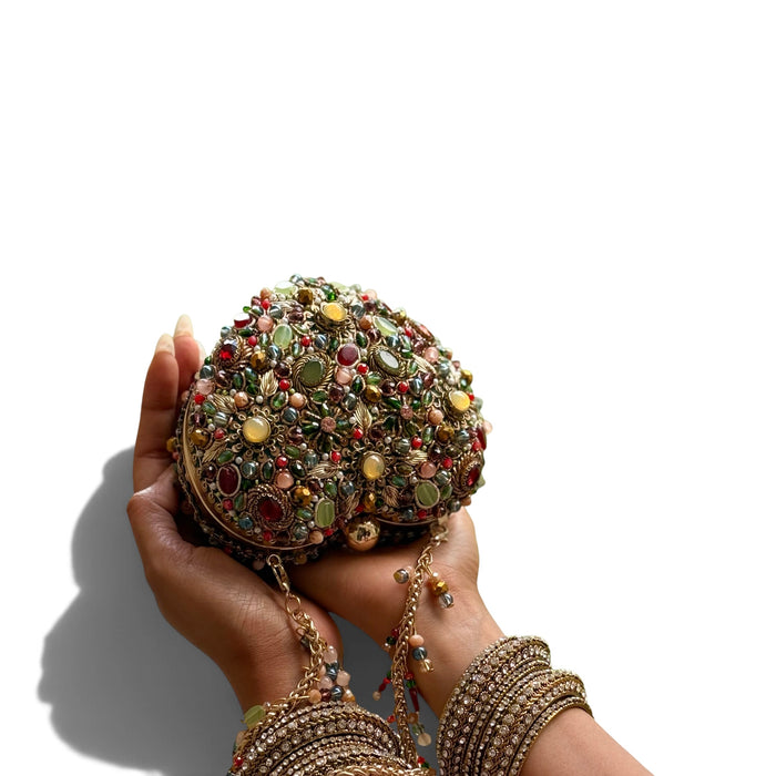 Royal Kundan Gemstone Clutch: Multicolor Hand-Embroidered Heart-Shaped Clutch