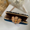 Royal blue clutch with gold floral embroidery