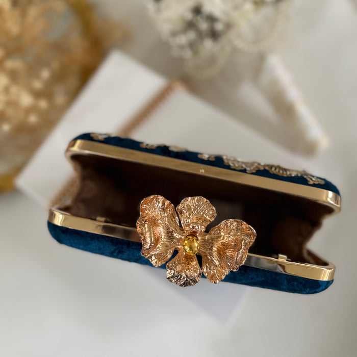 Royal blue clutch with gold floral embroidery