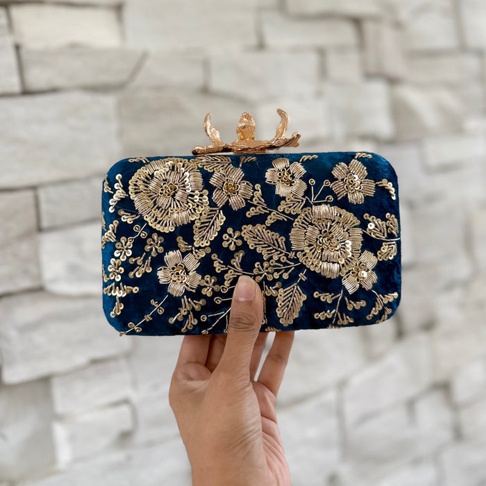 Royal blue clutch with gold floral embroidery