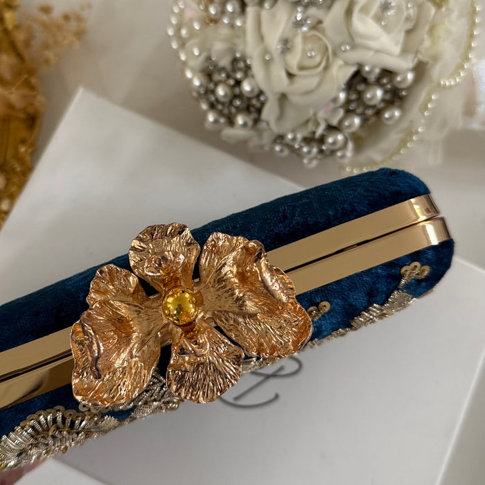 Royal blue clutch with gold floral embroidery