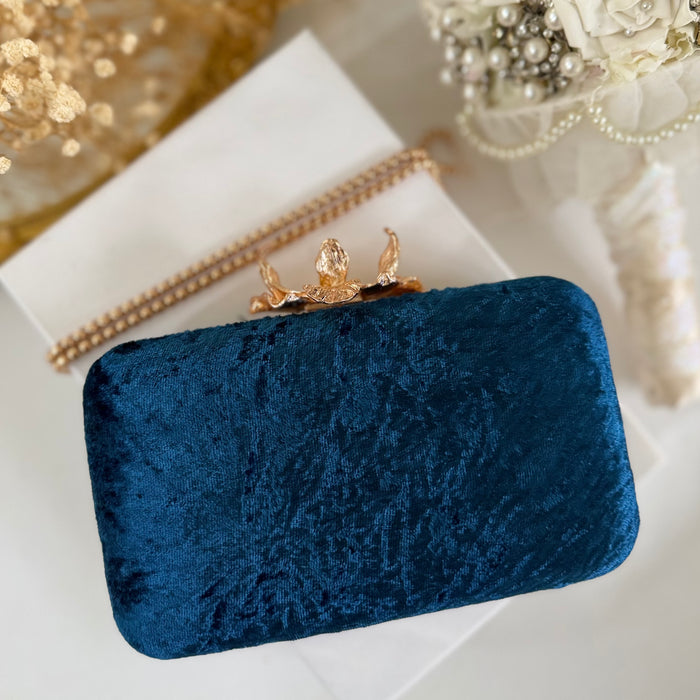 Royal blue clutch with gold floral embroidery