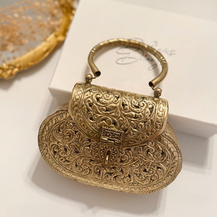 Handmade brass clutch with handle 